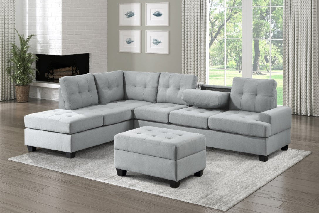 Full view of the 3-Piece Light Grey Fabric Reversible Sectional Sofa, showcasing the neutral upholstery and the versatile matching ottoman.