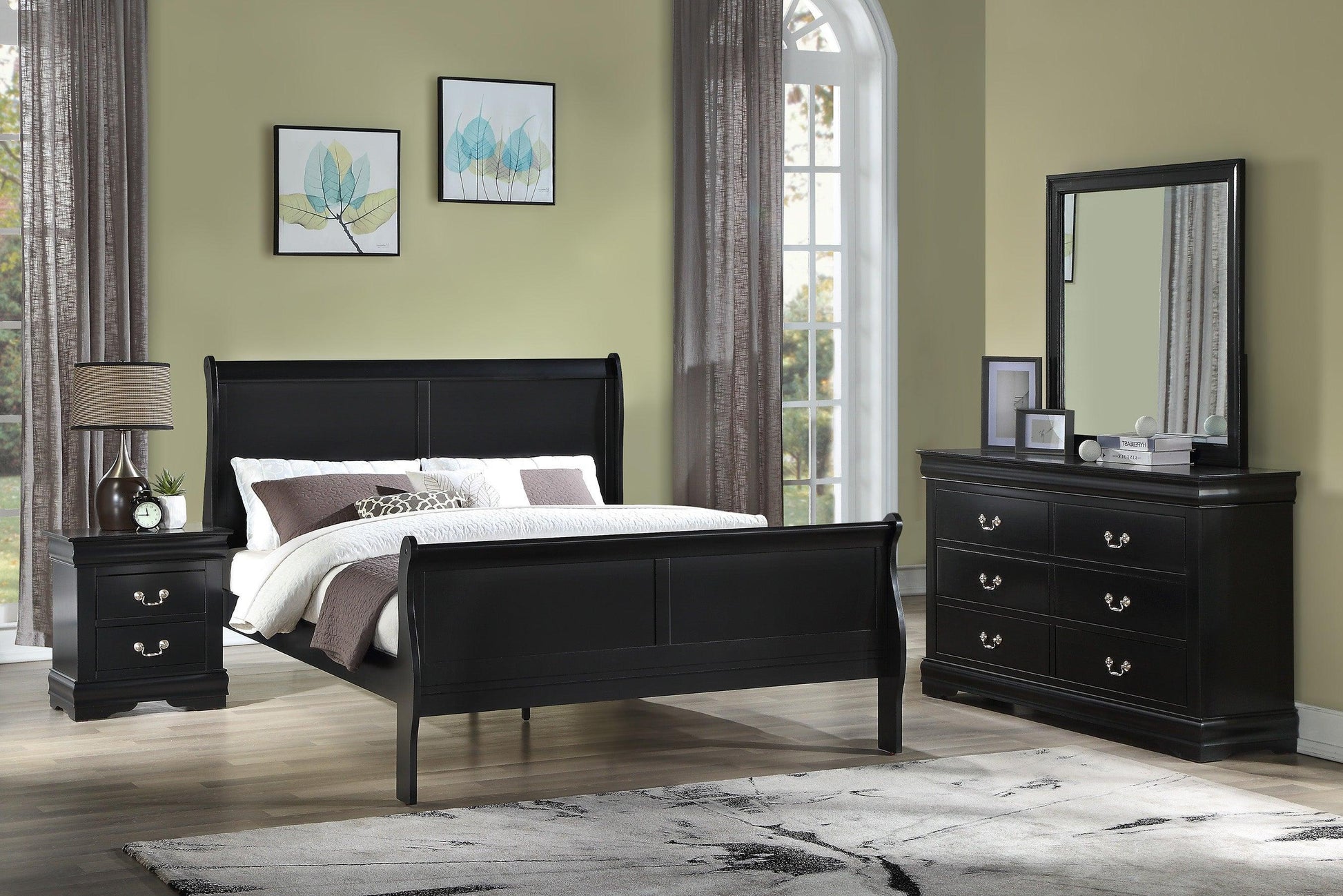 Full view of the Louis Philippe Black Wooden Sleigh Bedroom Set, showing the curved bed, dresser, mirror, and nightstand.