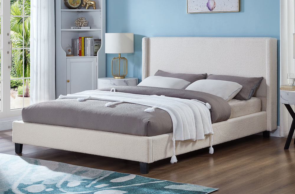 Chic boucle fabric platform bed showing detailed texture and durable frame construction
