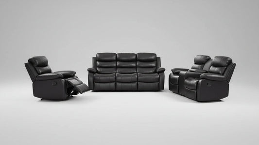 Full view of the Monoco Black Leather Manual Recliner 3-Piece Set, showing the sofa, loveseat, and chair arranged together in a living room.