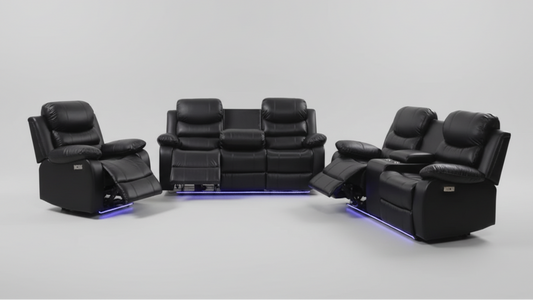 Full view of the Monoco Black Power Leather Recliner 3-Piece Set, showing the sofa, loveseat, and chair with integrated power headrests visible.
