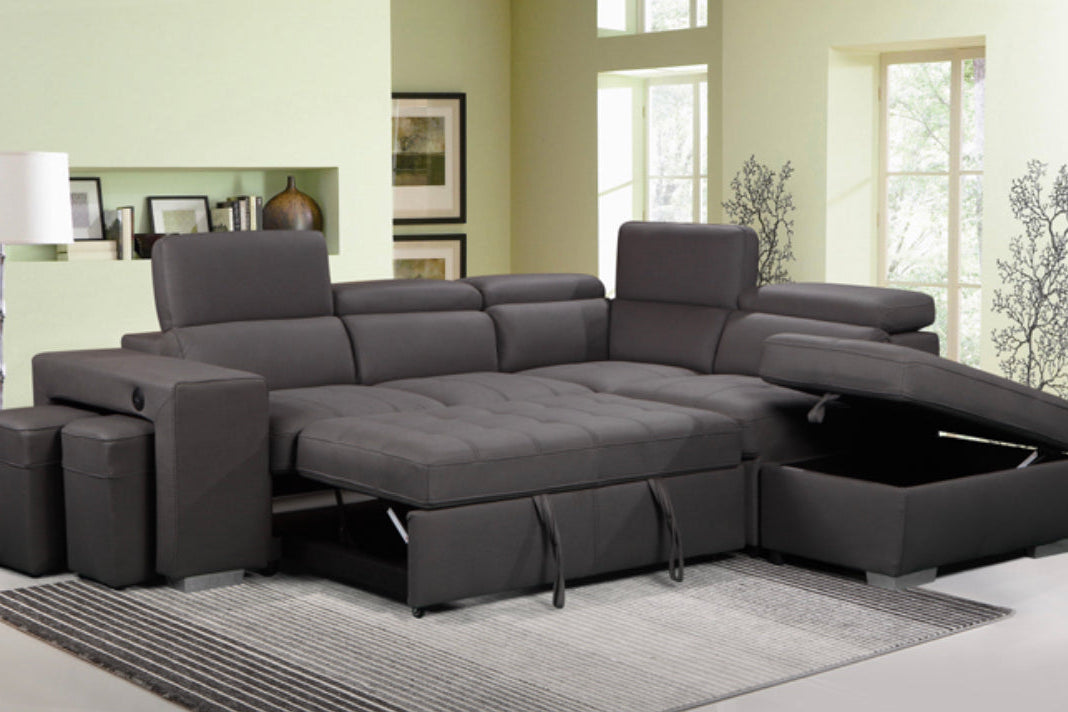 Full view of the Pasadena Large Sleeper Sectional Sofa Bed, showcasing its size and the coordinating storage ottoman.