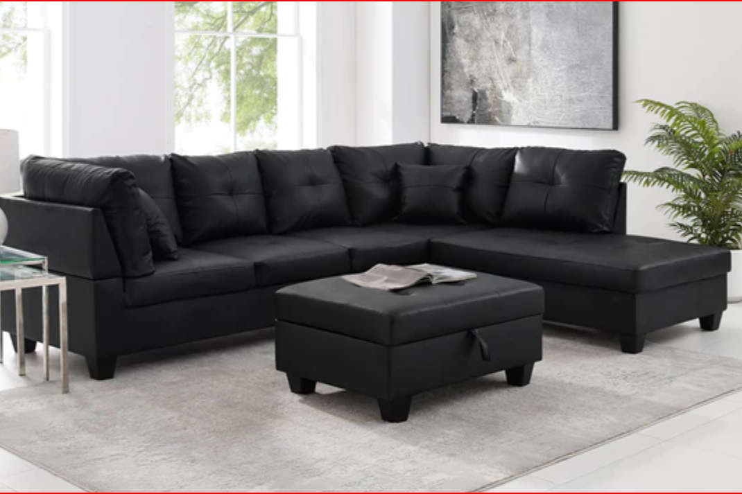 Full view of the PU Leather Sectional Sofa, showcasing the sleek upholstery, the fixed Left-Hand Chaise, and the matching storage ottoman.