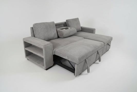 Full view of the Shelf Grey Corduroy Reversible Sectional Sofa, showcasing the ribbed texture and the pull-out sleeper function extended.