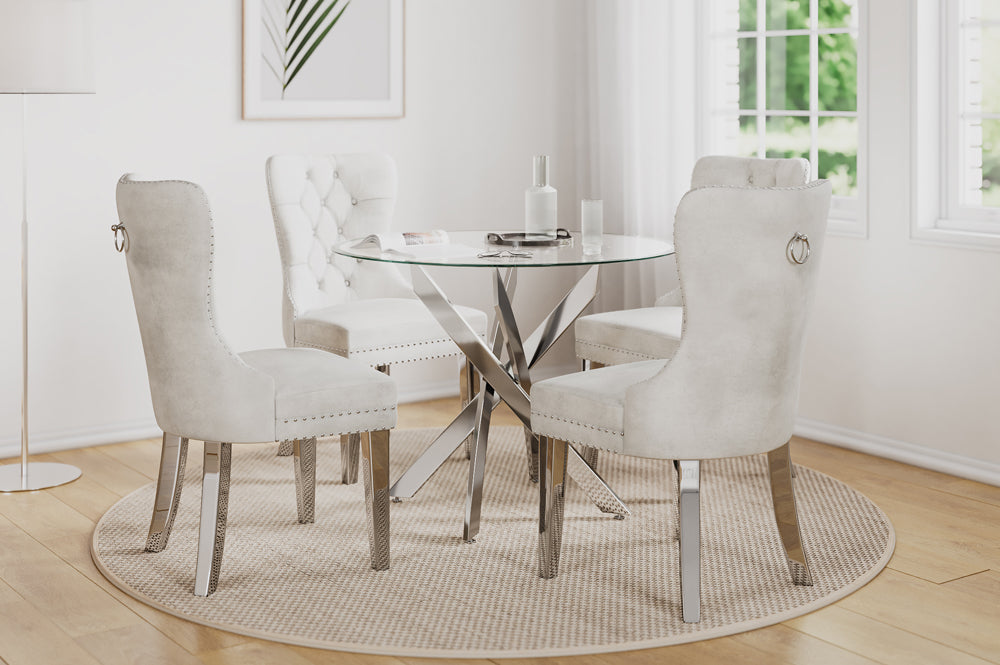 Close-up detail of a single dining chair, emphasizing the rich velvet fabric and the elegant diamond tufting pattern on the backrest.