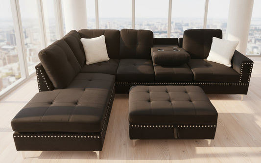 Full view of the Velvet Reversible Sectional Sofa, showcasing the plush fabric, the decorative nailhead stud trim, and the matching storage ottoman.