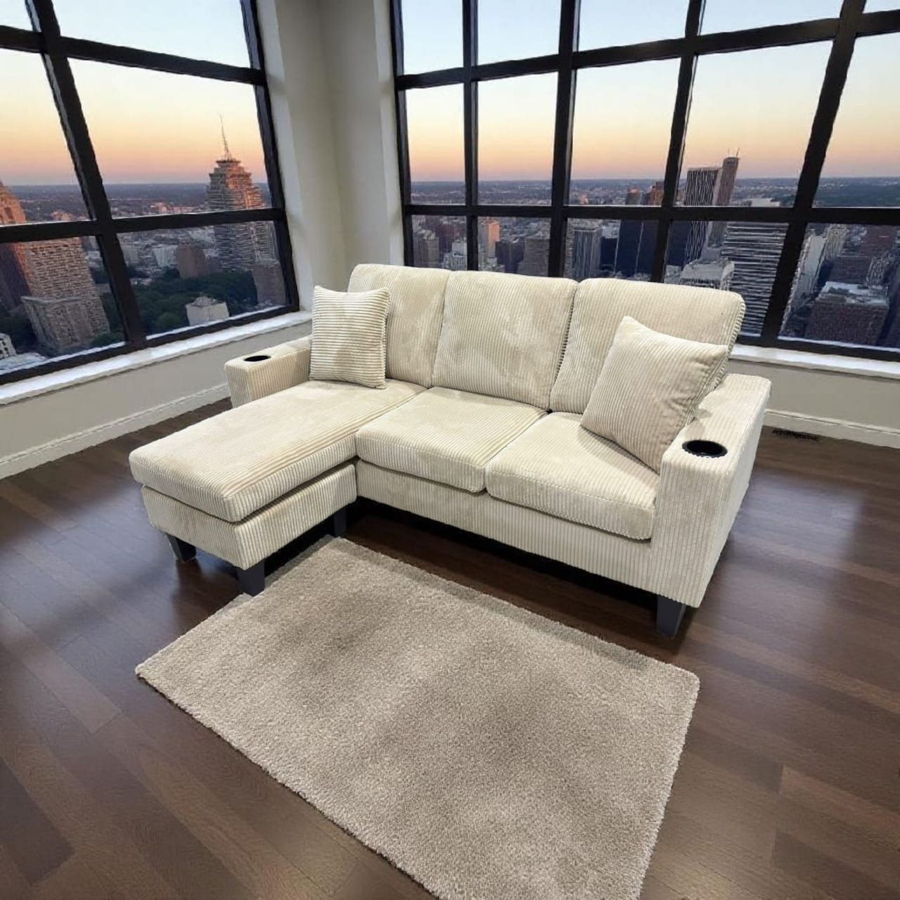 Close-up view of the sectional, highlighting the soft, ribbed texture of the Village Cream Corduroy fabric upholstery.