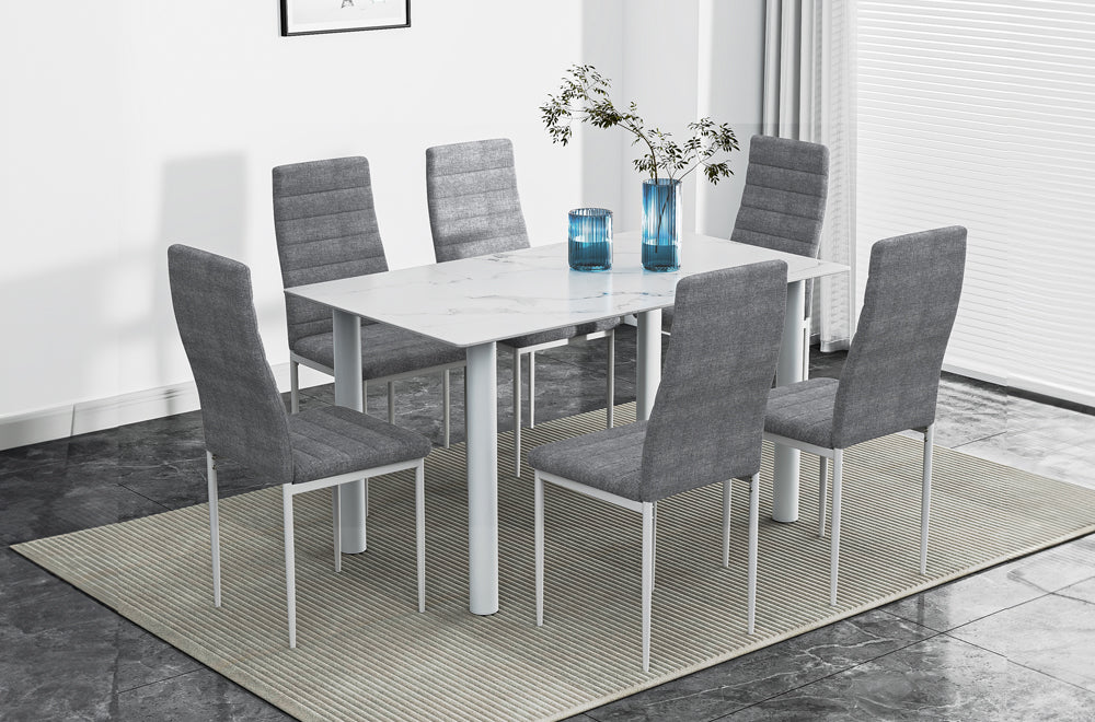 Full view of the White Marble Glass Dining Table set, showcasing the sleek marble-patterned glass top and six upholstered Grey Linen dining chairs.