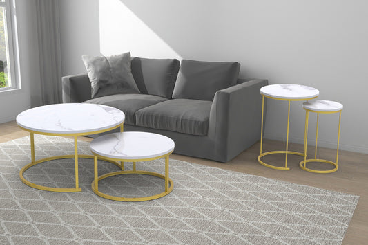 Full view of the 4 Piece White Marble Nesting Coffee Table Set, showing all tables arranged in a living space, highlighting the marble tops and brushed gold metal legs.